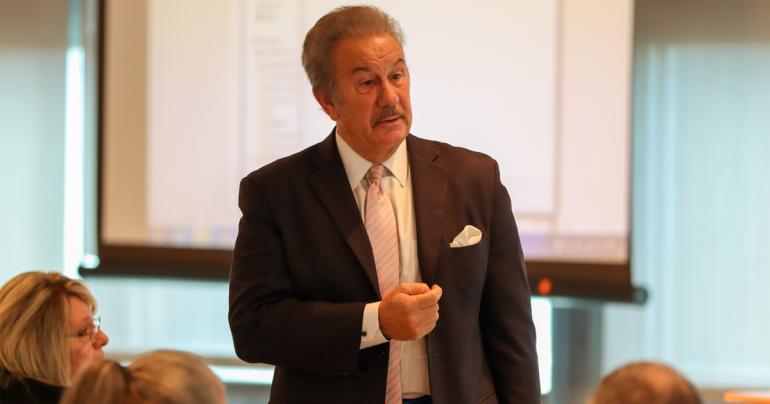 Glenville State College President Dr. Mark A. Manchin speaks to those gathered at the recent Council for Opportunity in Education workshop. (GSC Photo/Dustin Crutchfield)