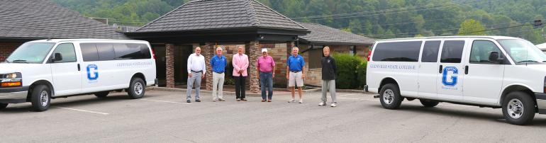 Flanked by the new vans for the men’s and women’s golf teams are (l-r) Glenville State College Athletic Director Jesse Skiles, Glenville State College Men’s Golf Coach John Lilly, Glenville State College President Dr. Mark Manchin, Ike Morris, Glenville State College Women’s Golf Coach Mike McGarry, and Glenville State College Assistant Golf Coach Bill Lilly (GSC Photo/Kristen Cosner)