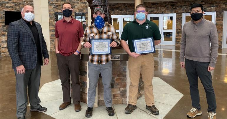 (l-r) Glenville State College Vice President of Advancement David Hutchison, Associate Professor of Forestry Dr. Brian Perkins, Rick Sypolt Scholarship recipient Robert Stearns, Ed Grafton Forestry Scholarship recipient Logan Hosaflook, and Department Chair and Professor of Forestry Dr. Rico Gazal.