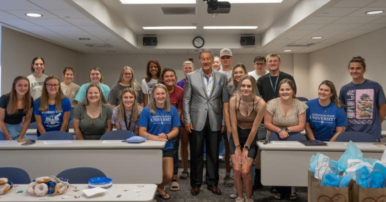 Glenville State University President Dr. Mark A. Manchin (center) with pre-nursing students. (GSU Photo/Kristen Cosner)