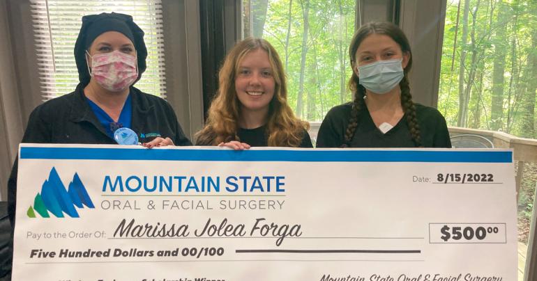 Glenville State University student Marissa Forga (center) with Vanessa Pruden (left) and Tara Lozier; Pruden and Lozier work in the Beckley office of Mountain State Oral and Facial Surgery. (Courtesy photo)