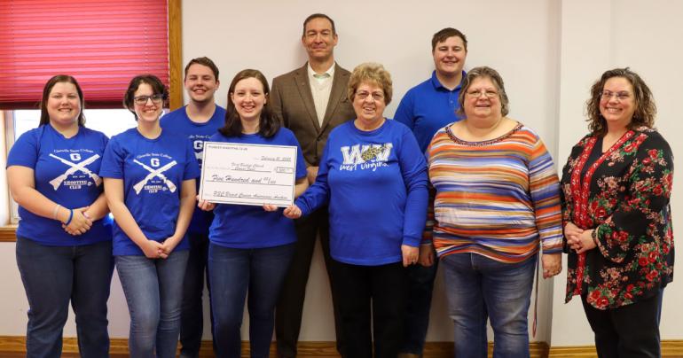 Members of the Glenville State University Pioneer Shooting Club making a $500 donation to the Glenville First Baptist Church Cancer Fund. Pictured are (l-r) Makayla McGuire, Faith Hardman, Brenden Davis, Emily Henline, Dr. Donal Hardin, Susie Sheets, Justin Sodergren, Teresa Lydick, and Michelle Clowser.