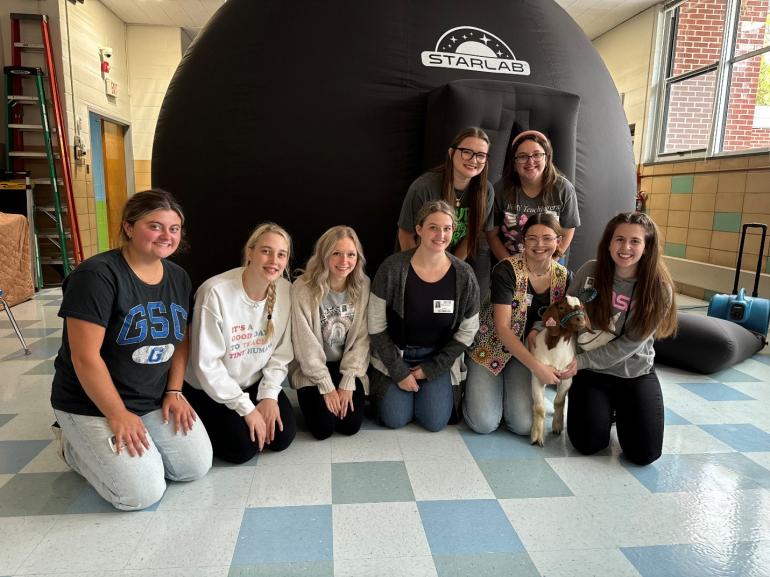  GSU STARLAB participants with “Jimmy” the Goat.  Back L/Rt: Jacey Collins and Sandra Crites Front L/R: Brianna Browning, Malerie Ross, Jayden Cover, Kylie Jackson, Bailea Huddleston, Maddox Lewis