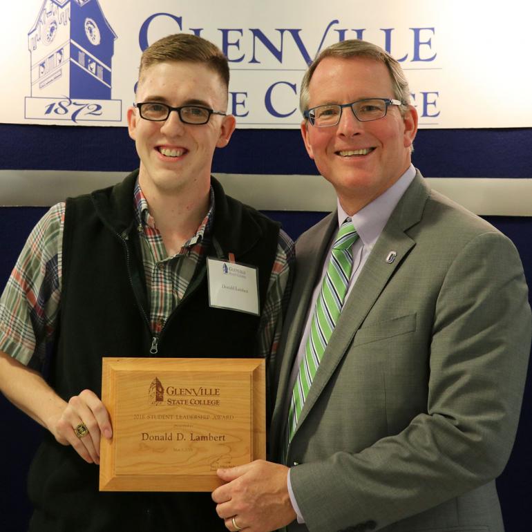 Student Leadership Award Recipient Donnie Lambert (left) with President Pellett