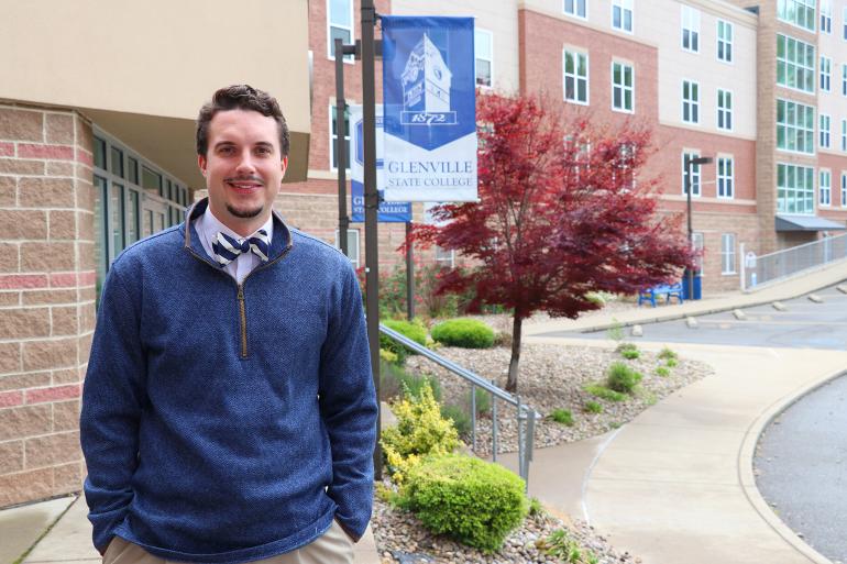 Trae Sprague, recipient of the 2020 GSC Staff Employee of the Year Award, outside of Goodwin Hall on campus (GSC Photo/Dustin Crutchfield)